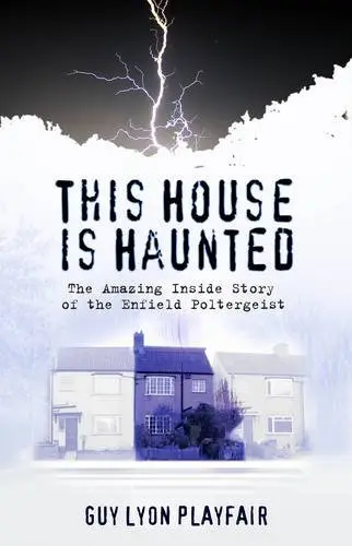 Cover of This House is Haunted